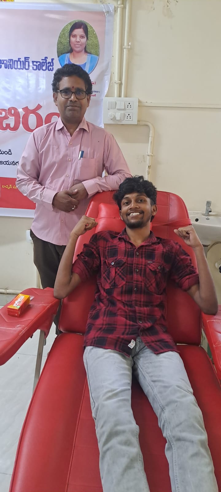 Student donating blood at the campus blood donation camp